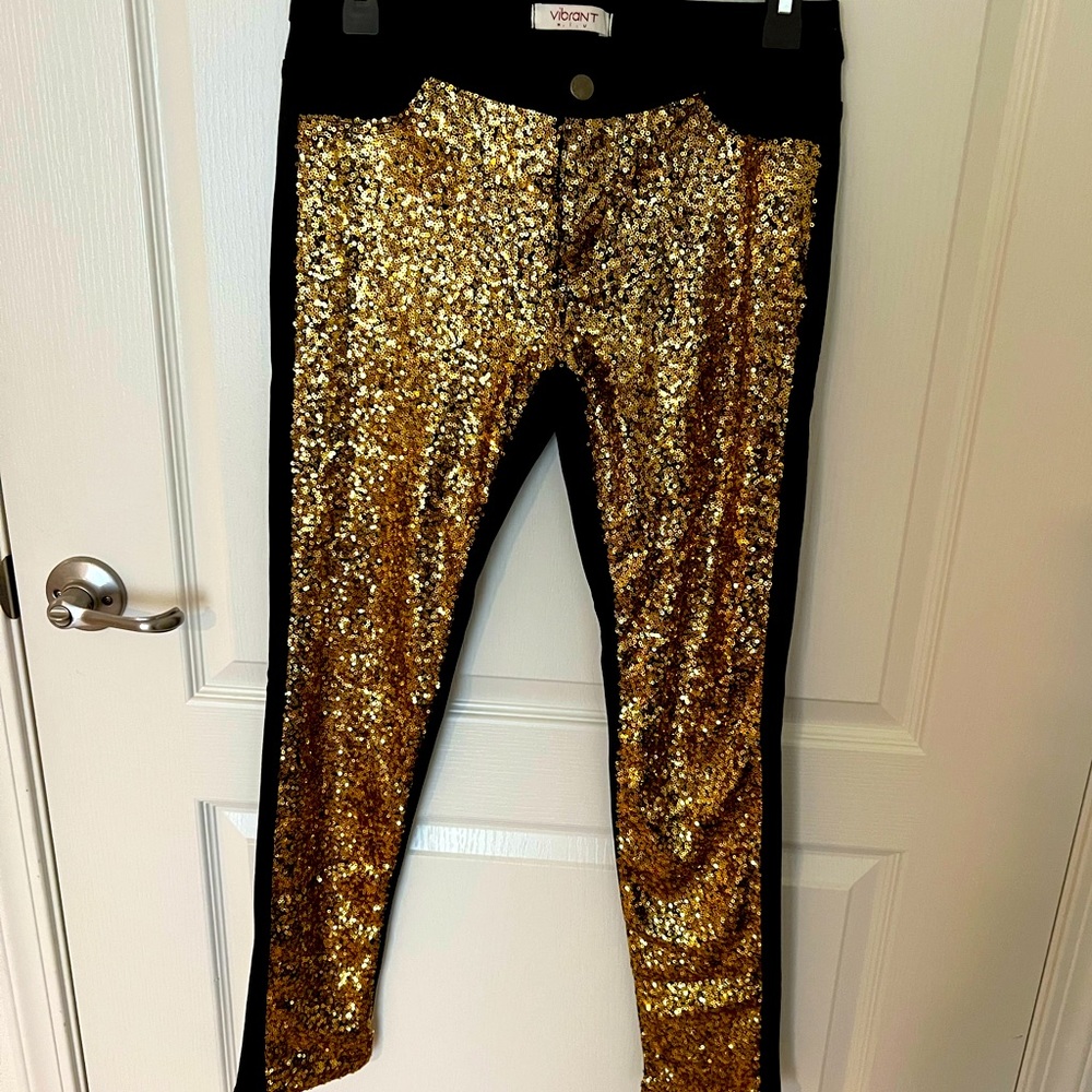 How fun are these! Gold sparkle front-all black back. Stretch party pants!